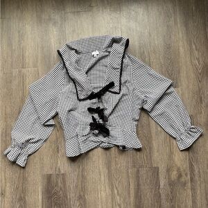 Black and White Checkered Blouse with Bow Accents